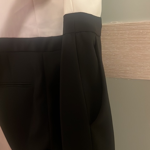 Vest jumpsuit with shoulder pads - Picture 7 of 7